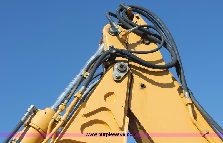 image for item F6142 1997 John Deere 310E backhoe