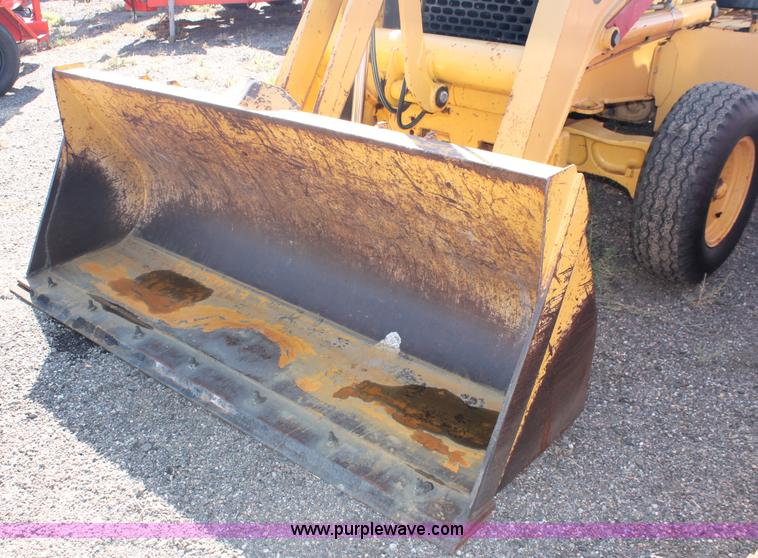 image for item F6142 1997 John Deere 310E backhoe