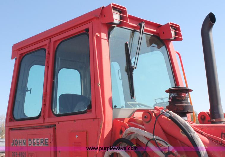 image for item F6143 1991 John Deere 555G crawler loader