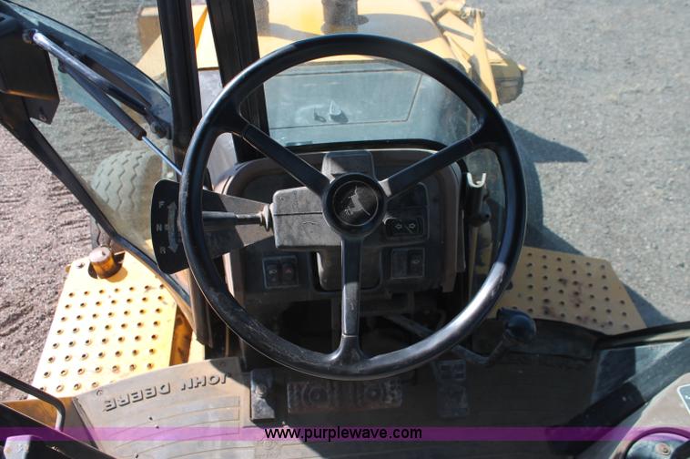 image for item F6144 1997 John Deere 310E backhoe