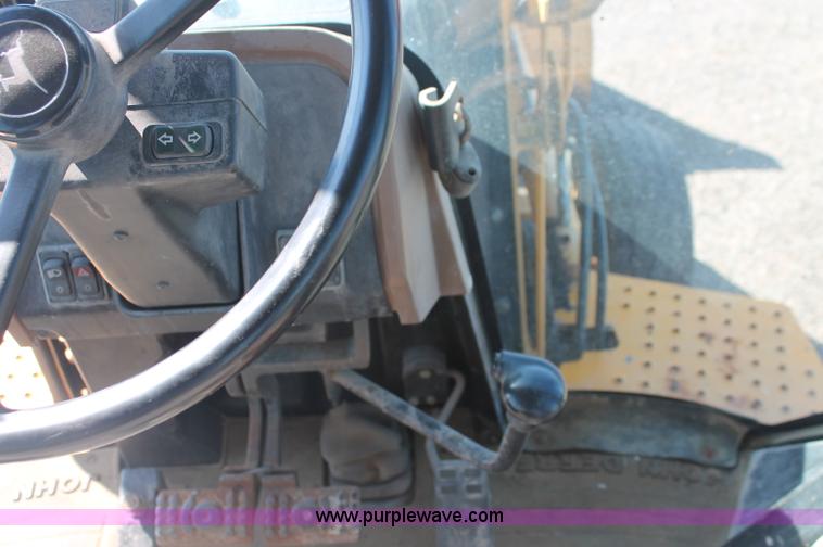 image for item F6144 1997 John Deere 310E backhoe