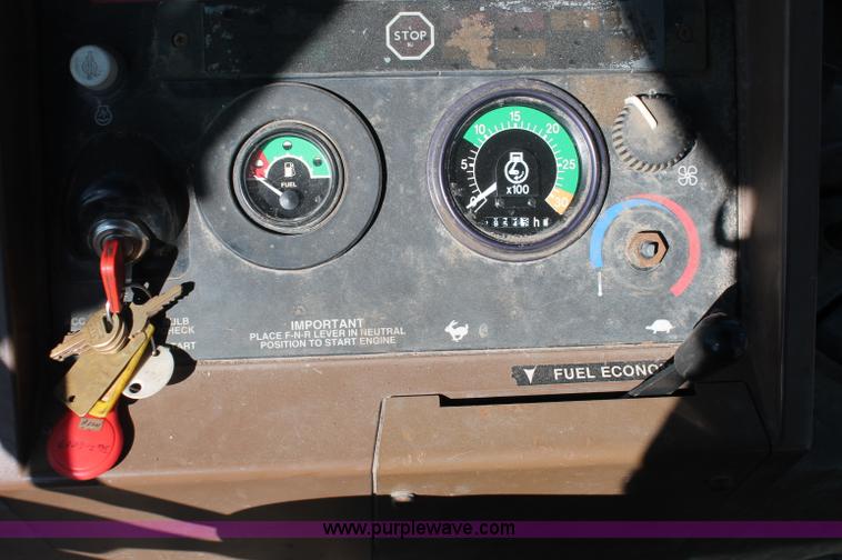 image for item F6144 1997 John Deere 310E backhoe