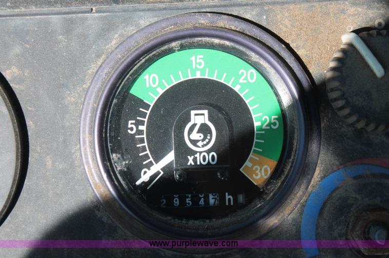 image for item F6144 1997 John Deere 310E backhoe