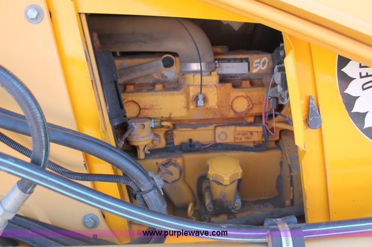image for item F6144 1997 John Deere 310E backhoe