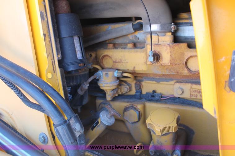 image for item F6144 1997 John Deere 310E backhoe