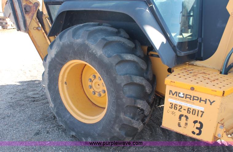 image for item F6144 1997 John Deere 310E backhoe