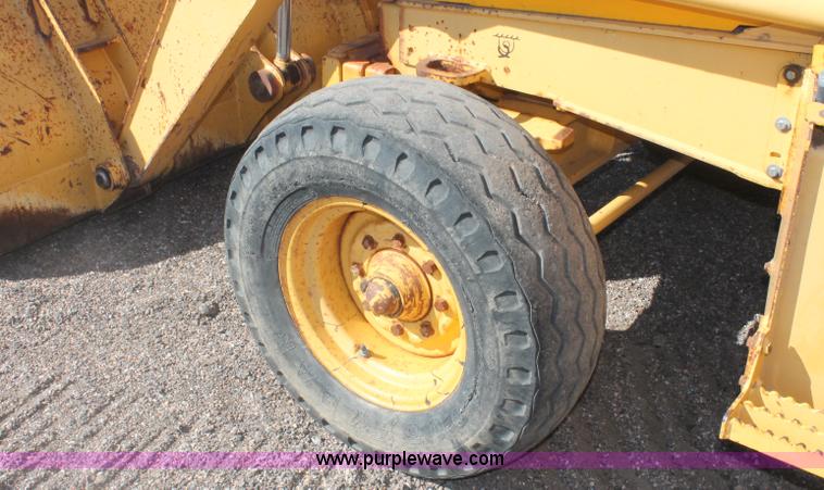 image for item F6144 1997 John Deere 310E backhoe