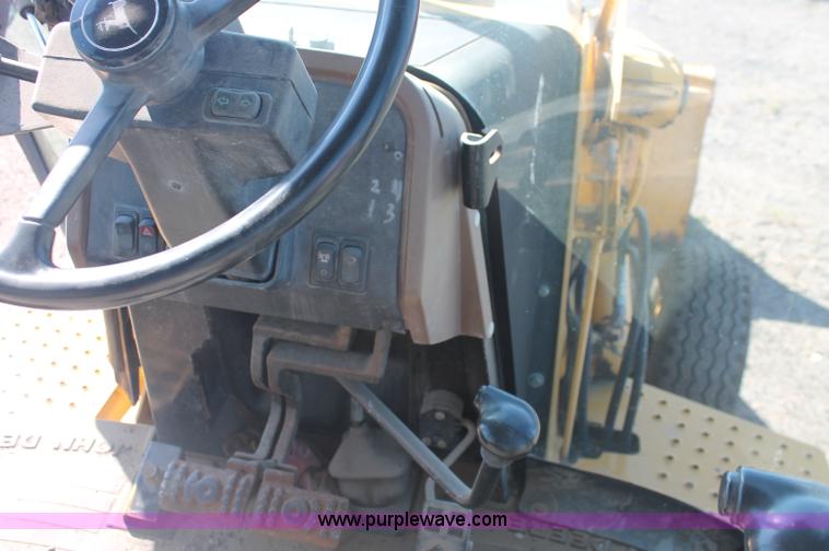 image for item F6145 1997 John Deere 310E backhoe