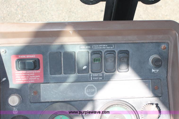 image for item F6145 1997 John Deere 310E backhoe