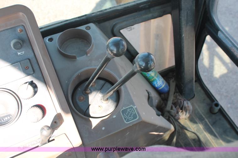 image for item F6145 1997 John Deere 310E backhoe