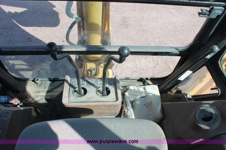 image for item F6145 1997 John Deere 310E backhoe