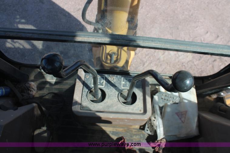 image for item F6145 1997 John Deere 310E backhoe