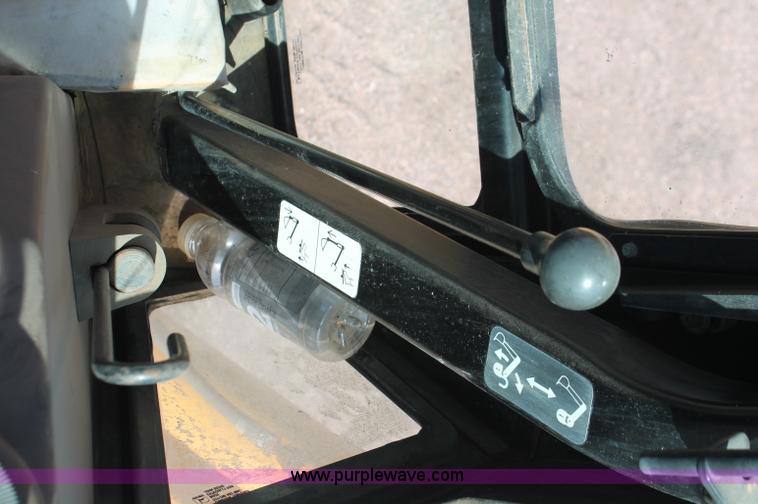 image for item F6145 1997 John Deere 310E backhoe