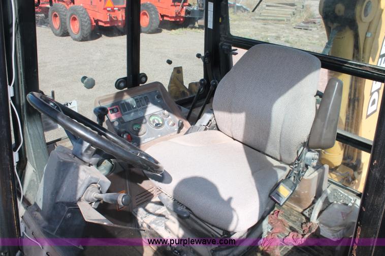 image for item F6145 1997 John Deere 310E backhoe
