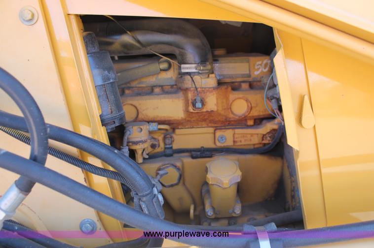 image for item F6145 1997 John Deere 310E backhoe