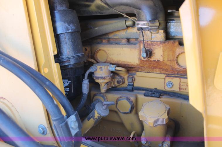 image for item F6145 1997 John Deere 310E backhoe