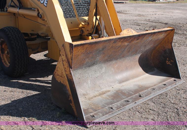 image for item F6145 1997 John Deere 310E backhoe