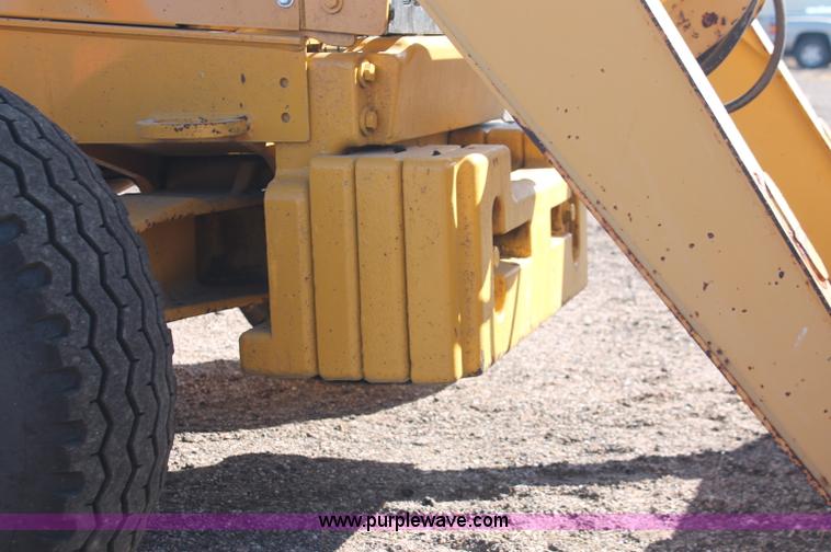 image for item F6145 1997 John Deere 310E backhoe