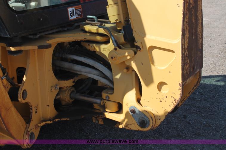 image for item F6145 1997 John Deere 310E backhoe