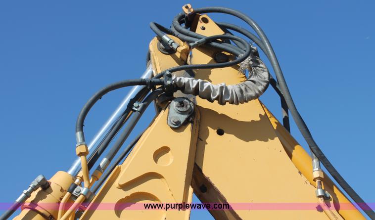 image for item F6145 1997 John Deere 310E backhoe