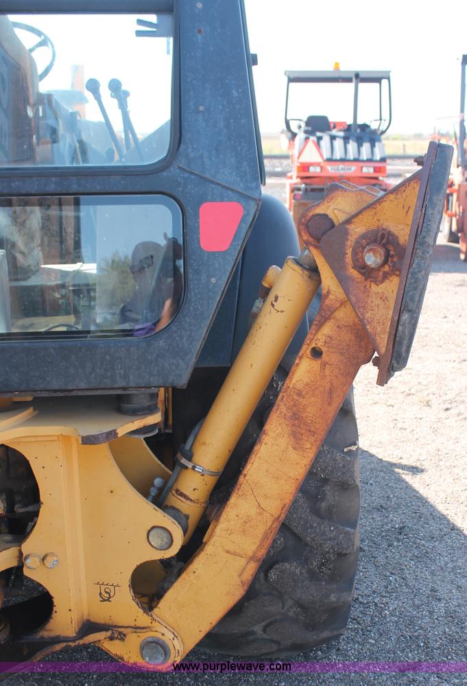 image for item F6145 1997 John Deere 310E backhoe