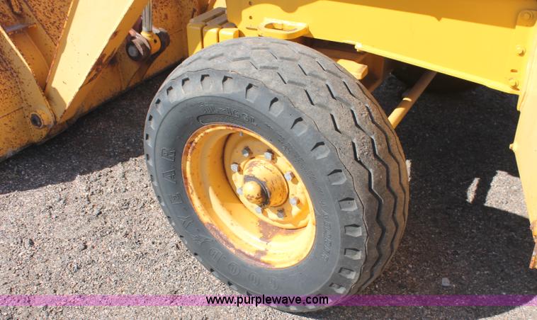 image for item F6145 1997 John Deere 310E backhoe