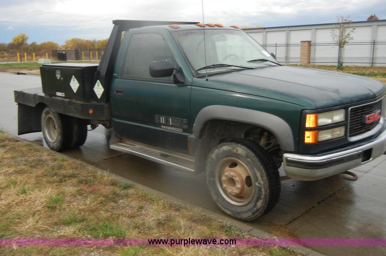 image for item D4792 1996 GMC Sierra 3500 SLE flatbed pickup truck