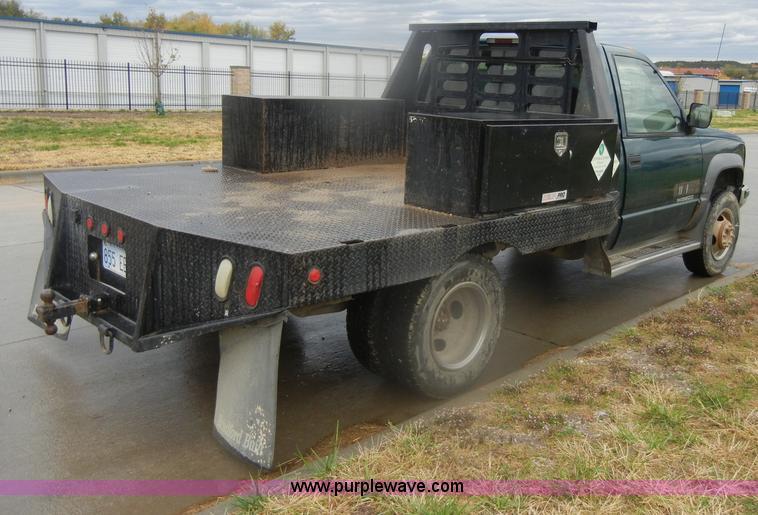 image for item D4792 1996 GMC Sierra 3500 SLE flatbed pickup truck