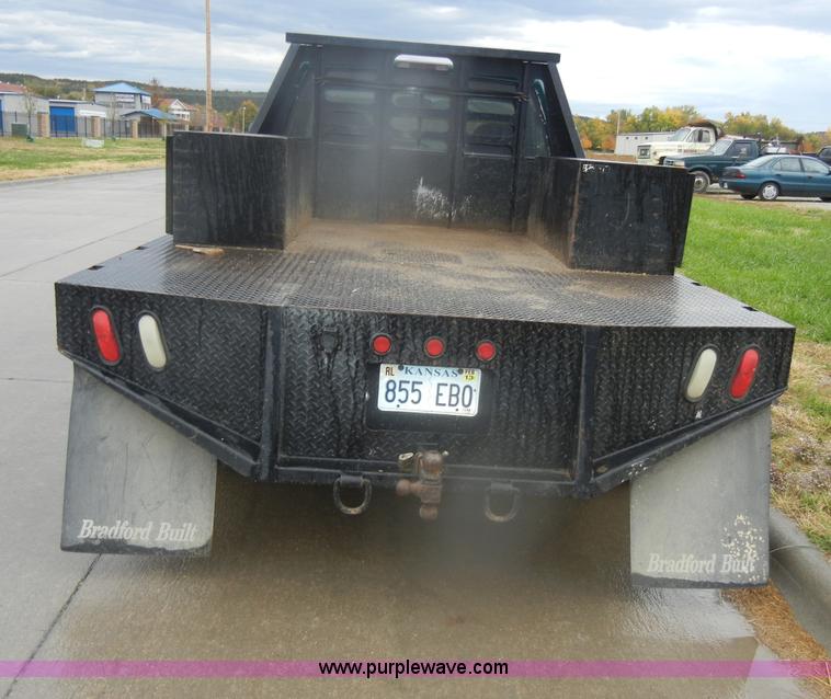 image for item D4792 1996 GMC Sierra 3500 SLE flatbed pickup truck