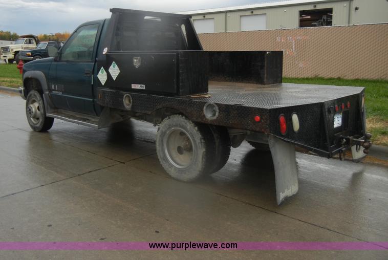image for item D4792 1996 GMC Sierra 3500 SLE flatbed pickup truck