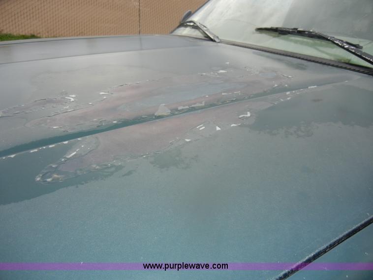 image for item D4792 1996 GMC Sierra 3500 SLE flatbed pickup truck