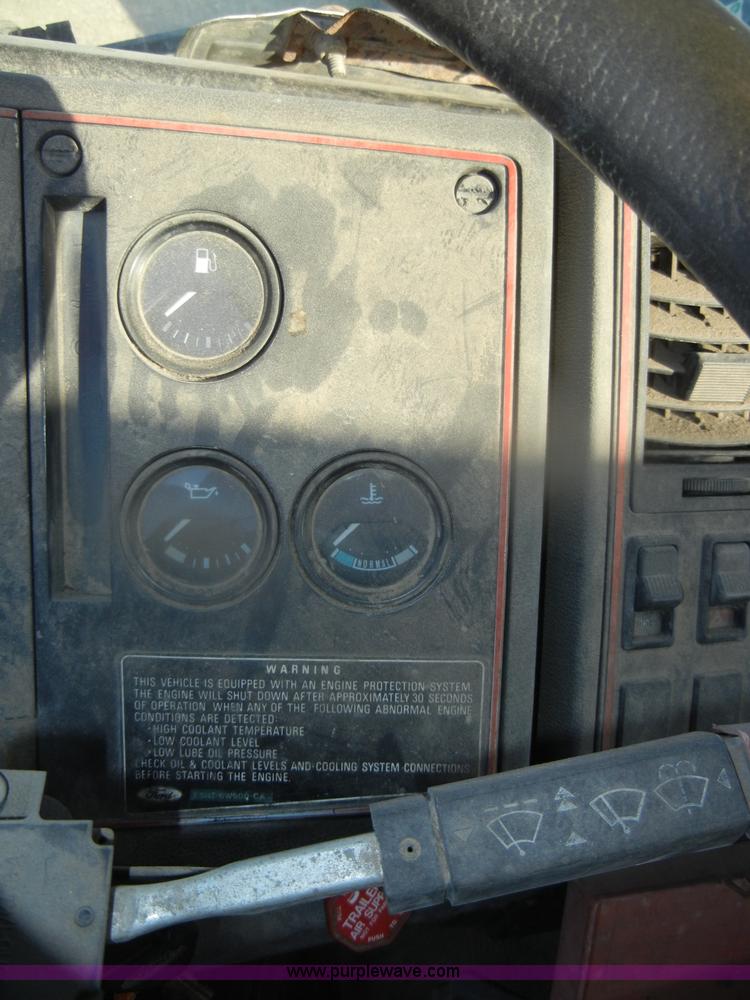 image for item D4904 1986 Ford CF6000 flatbed truck