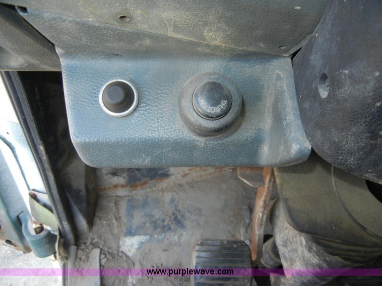 image for item D4904 1986 Ford CF6000 flatbed truck