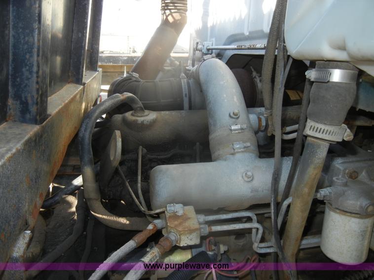 image for item D4904 1986 Ford CF6000 flatbed truck