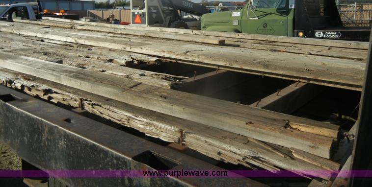 image for item D4904 1986 Ford CF6000 flatbed truck