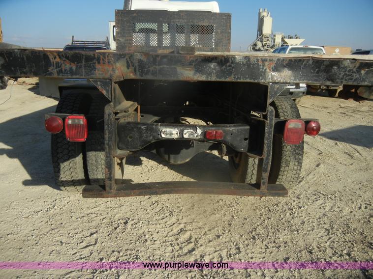 image for item D4904 1986 Ford CF6000 flatbed truck