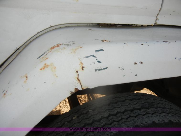 image for item D4904 1986 Ford CF6000 flatbed truck