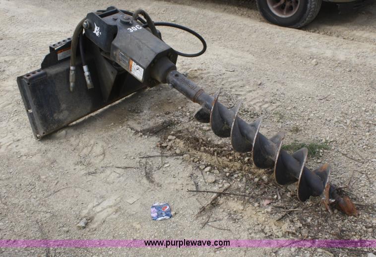 image for item D4912 Bobcat 30C post hole digger