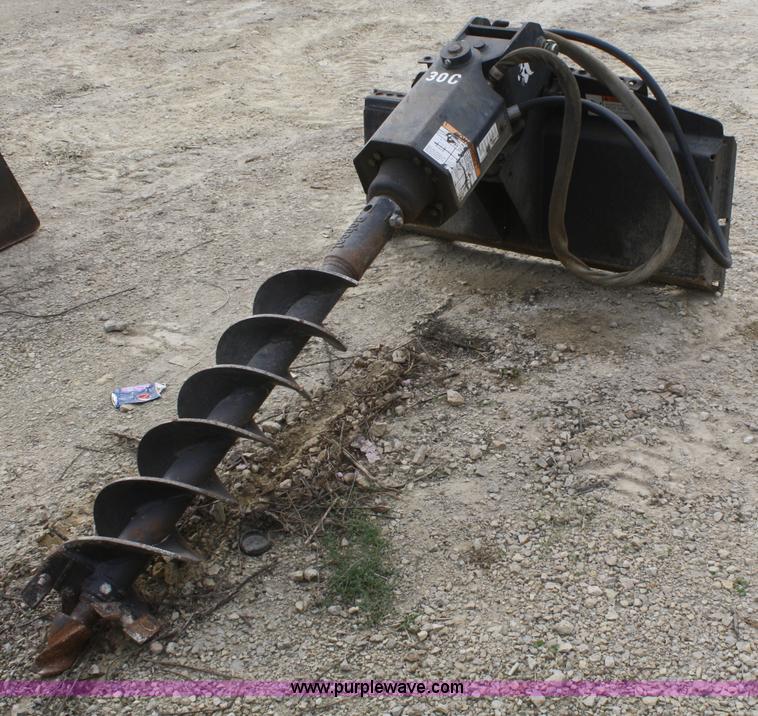 image for item D4912 Bobcat 30C post hole digger