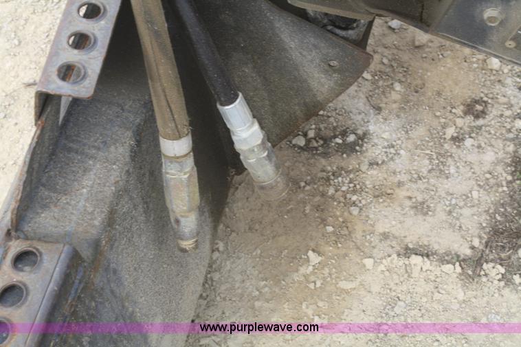 image for item D4912 Bobcat 30C post hole digger