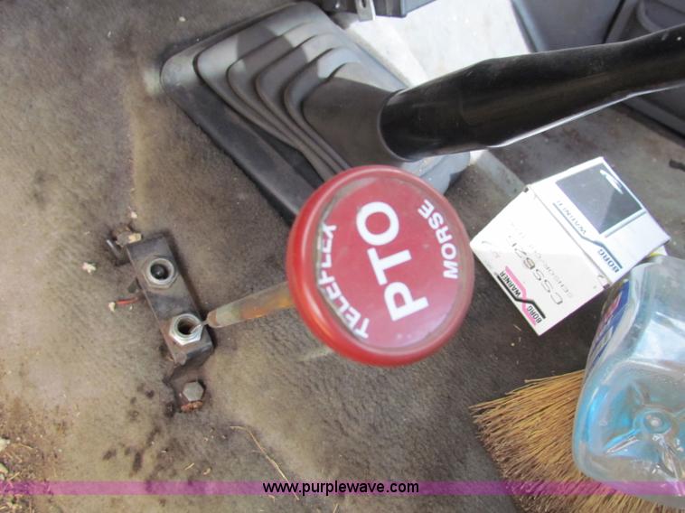 image for item B1659 1994 Ford Super Duty XLT roll back truck