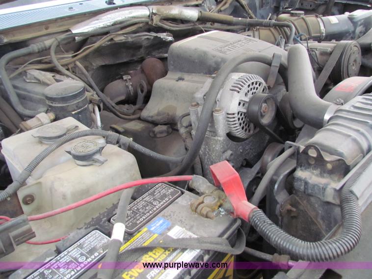 image for item B1659 1994 Ford Super Duty XLT roll back truck