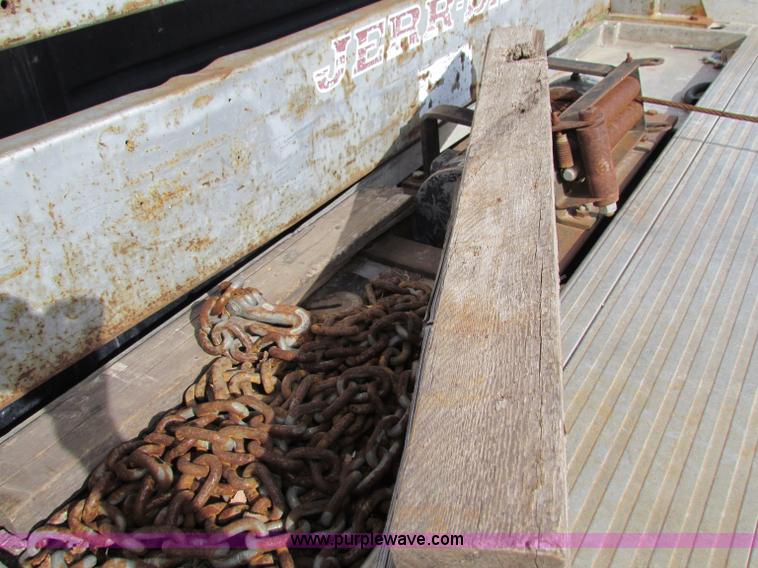 image for item B1659 1994 Ford Super Duty XLT roll back truck