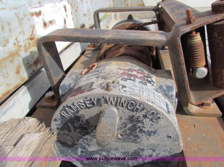 image for item B1659 1994 Ford Super Duty XLT roll back truck