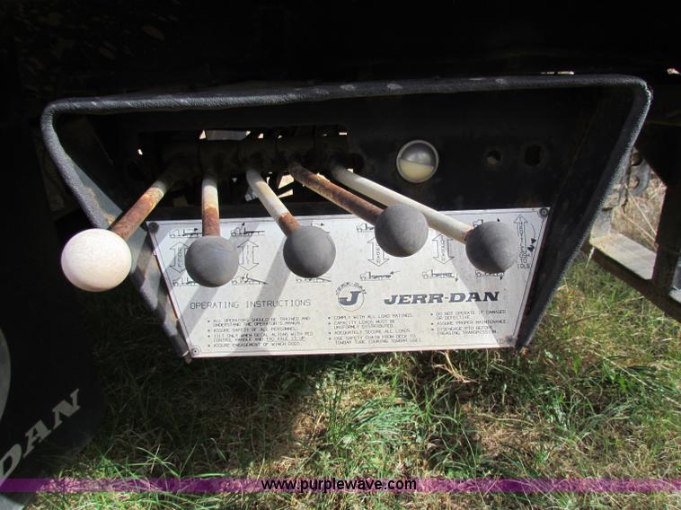 image for item B1659 1994 Ford Super Duty XLT roll back truck