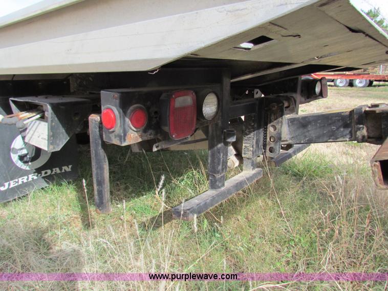 image for item B1659 1994 Ford Super Duty XLT roll back truck