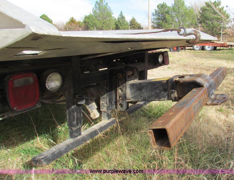 image for item B1659 1994 Ford Super Duty XLT roll back truck