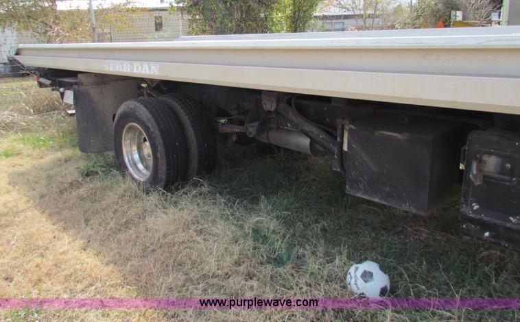 image for item B1659 1994 Ford Super Duty XLT roll back truck