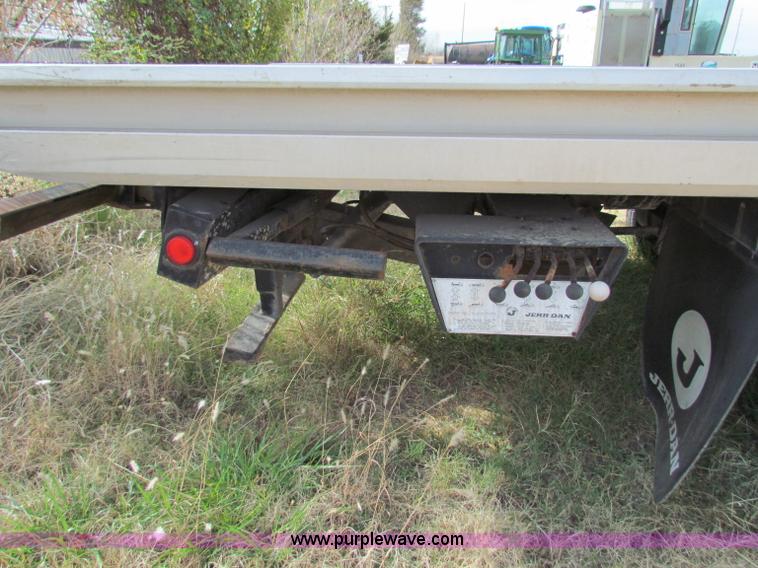 image for item B1659 1994 Ford Super Duty XLT roll back truck