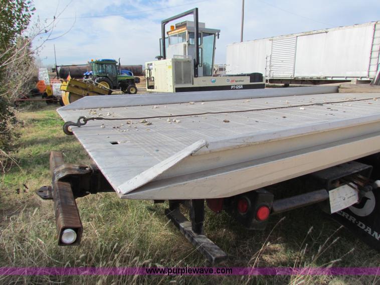 image for item B1659 1994 Ford Super Duty XLT roll back truck